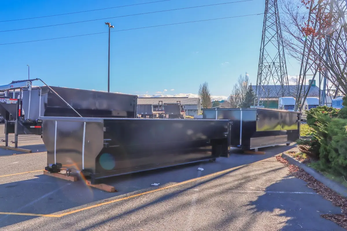 Roll-off dumpster ready for waste disposal at job site for Construction Dumpster Rental in Westbrook
